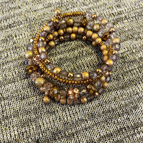 Golden bracelet with multiple layers purple - Picture 1 of 1